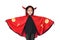 Happy laughing little Asian child girl dressed Halloween costume. Kid in Dracula robe  on white background