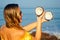 Happy and laughing young girl holding coconuts.woman with coconut on tropical island on shore beach.exotic spa resort