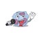 Happy leukocyte cell singing on a microphone