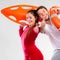 Happy lifeguard couple with equipment