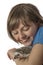 Happy litle girl with African pygmy hedgehog