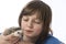 Happy litle girl with her pet African pygmy hedgehog