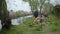 Happy little boy grandson loving grandparents having fun together flying a kite outdoors