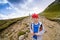 Happy little boy on mountain track