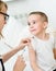 Happy little boy receiving injection or vaccine