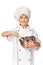 Happy little Chef girl with ladle girl having fun making cookies