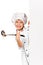 Happy little Chef girl with ladle. Isolated