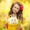 Happy little girl with easter rabbit