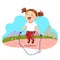 Happy little girl jumping rope in the park