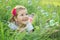 Happy little girl playing with bubbles