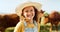 Happy little girl, portrait smile and farm with animals enjoying travel and nature in the countryside. Child smiling in
