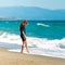 Happy little girl in a wetsuit