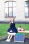 Happy little preschool child girl in a vintage dress with books, apples on her first day to school or kindergarten. Healthy child