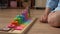Happy Little Preschool Toothless Girl Playing With Colored Wooden Toy. Cute Kids Learn To Count By Playing Teaches