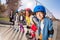 Happy little roller skaters having fun outdoors