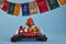 Happy Losar, Tibetan New Year background. Text on flags Om mani padme hum meaning The jewel is in the lotus