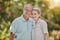 Happy, love and portrait of a senior couple standing in a green garden while on a picnic on vacation. Happiness, smile