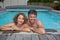 Happy and lovely couple in private swimming pool