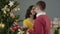 Happy loving couple dancing at Christmas party, saying wishes to each other