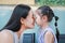 Happy loving family, Close up of mother and child girl kissing