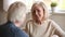 Happy loving older couple having fun talking on date