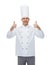 Happy male chef cook showing thumbs up