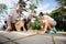 Happy Male And Female Friends Solving Wooden Planks Puzzle