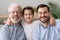 Happy male intergenerational 3 three generation men family portrait