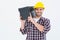 Happy male repairman carrying toolbox on shoulder