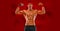 Happy man athlete with dumbbell on red background. Gym full body workout. Muscular man athlete in fitness gym have havy