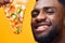 happy man black guy delivery fast smile isolated food overeating pizza food background