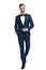 Happy man in blue tuxedo walking with hand in pocket