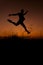 Happy man jumping silhouette