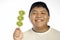 Happy man and kiwi fruit