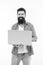 Happy man with notebook. Searching for new job. Bearded man using notebook. Bearded happy man surfing inet on notebook