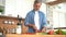 Happy man preparing romantic surprise, smiling husband cooking healthy food