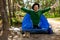 A Happy Man Puts Up A Tent On The Site Of A Future Camp In The Forest