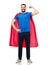 Happy man in red superhero cape