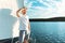Happy Man Sailing On Yacht Standing On Deck Outside