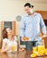 Happy man serves breakfast her beloved wife