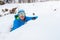 Happy man, snowboarder resting at a ski resort