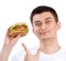 Happy man with tasty fast food unhealthy burger sandwich