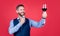 Happy man toastmaster raise glass of wine to propose toast before drinking red background, cheers