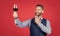 Happy man toastmaster raise glass of wine to propose toast before drinking red background, cheers
