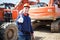 Happy man at work in a construction site