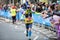 Happy Marathon runner cheering by public. Charity money raise.. London, UK