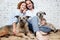 A happy married couple with their dogs, a seed portrait, love, c