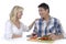 Happy mature couple cutting vegetables