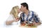 Happy mature couple kissing while preparing