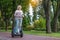 Happy mature lady driving segway